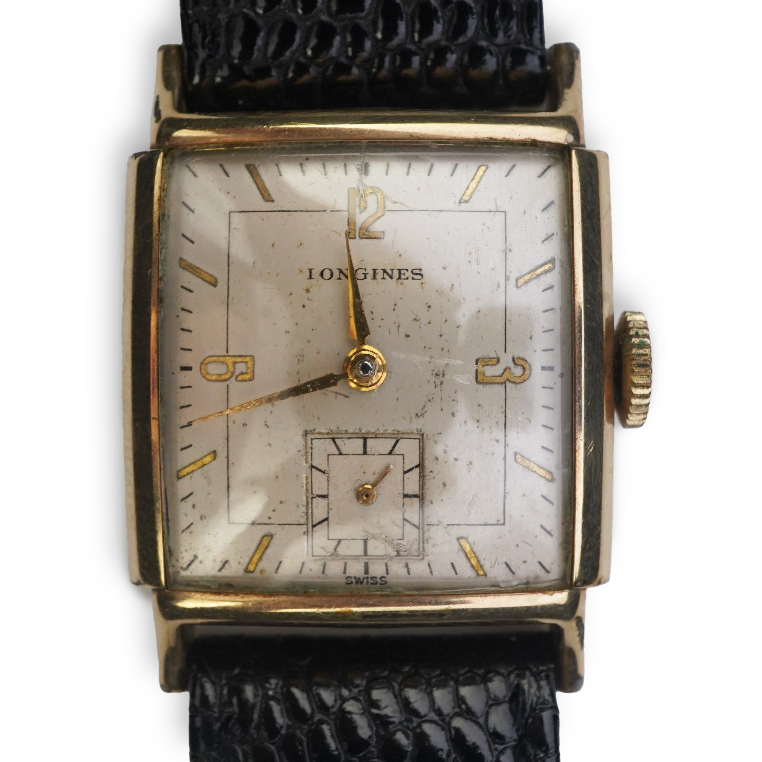 A gentleman's late 1940's gold plated Longines manual wind wrist watch, on a later associated leather strap